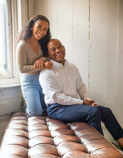 Senior Sarah Sloan poses with her father Dr. Timothy Sloan ahead of their book's release.