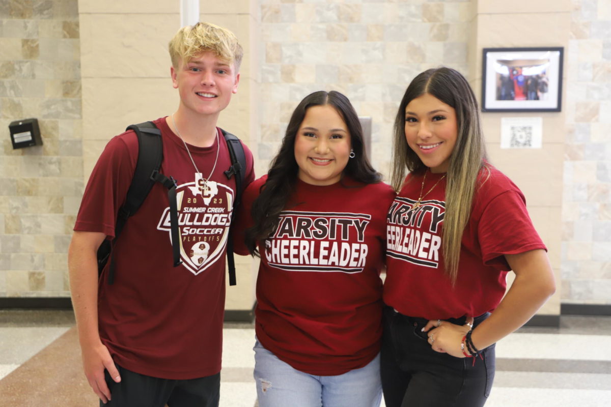 Seniors Bailee Walker, Felicity Garcia, Chelsea Real pose during the first Maroon Out Friday.