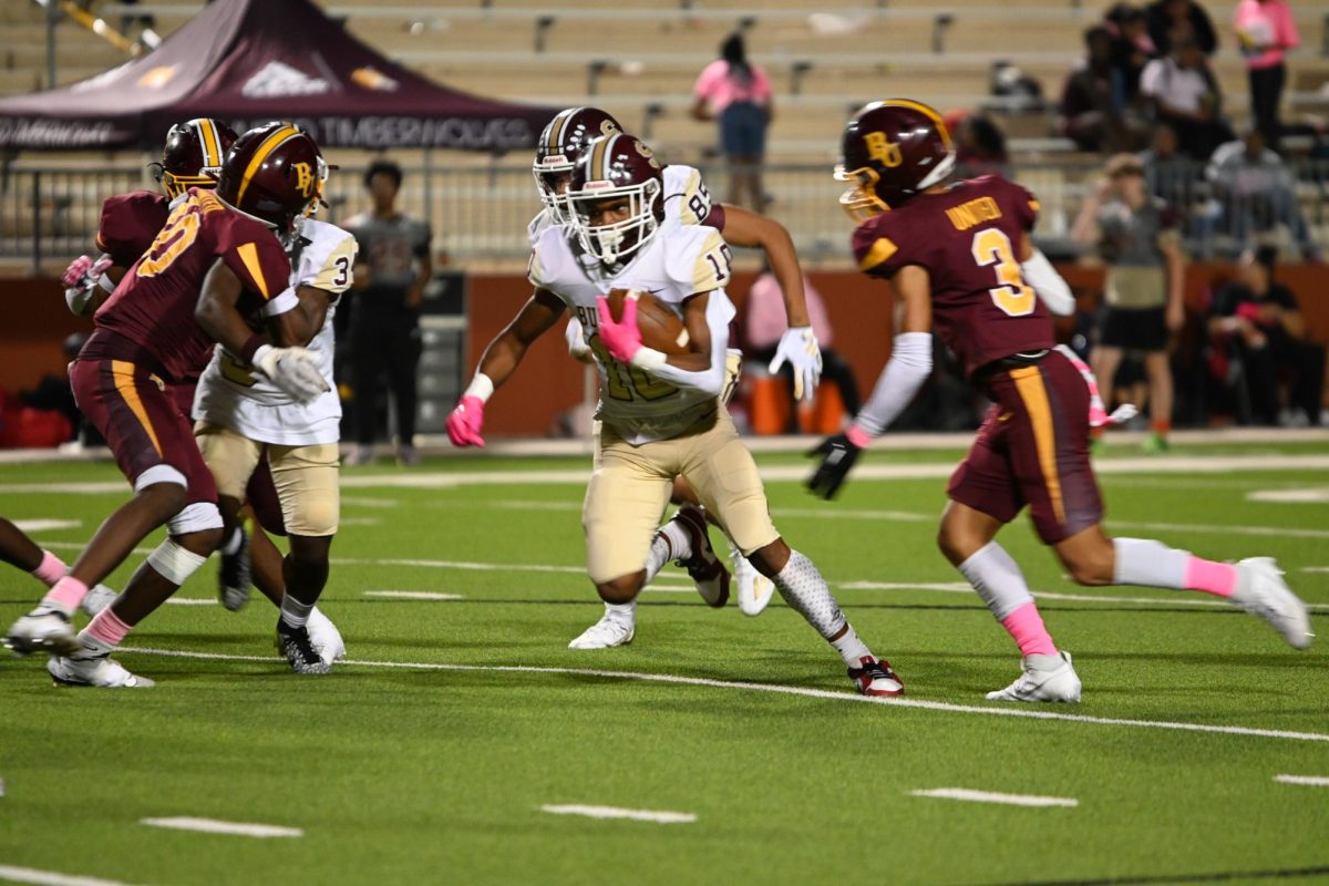 Freshman Wide Receiver Tre Brown receives a catch  