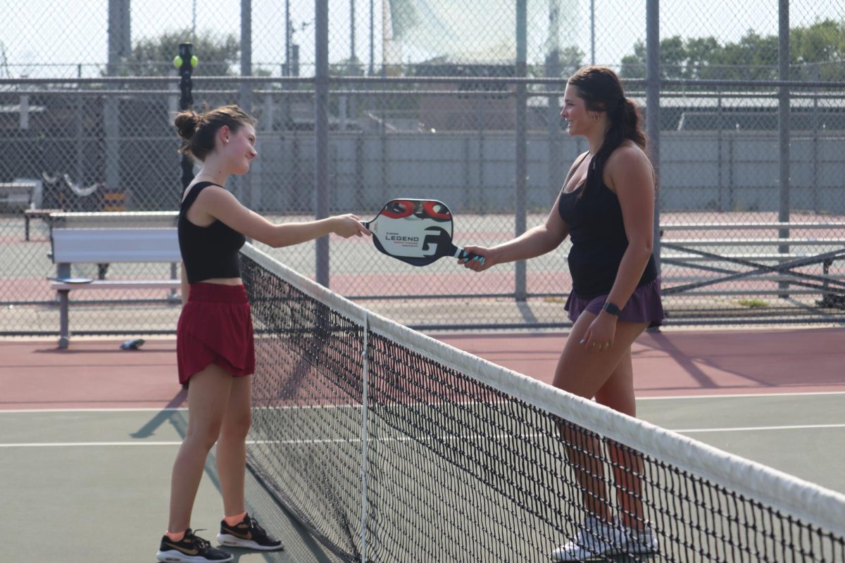 Juniors Keri Ovalle and Julia Martin play pickleball after school on Aug. 21.