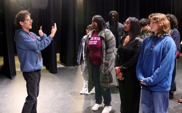 Mr. Wesley Vineyard brings his tech theatre students to the stage for a hands-on lesson.