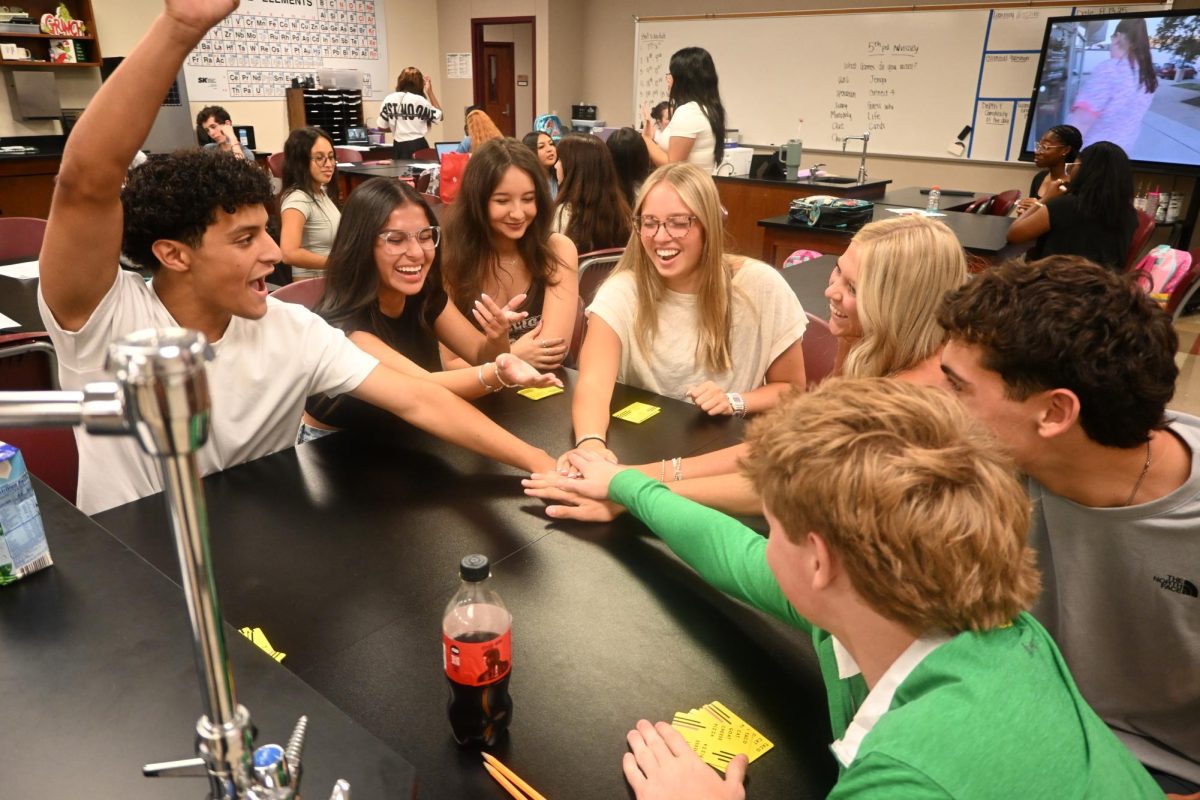 Students play card games to pass time in classrooms.