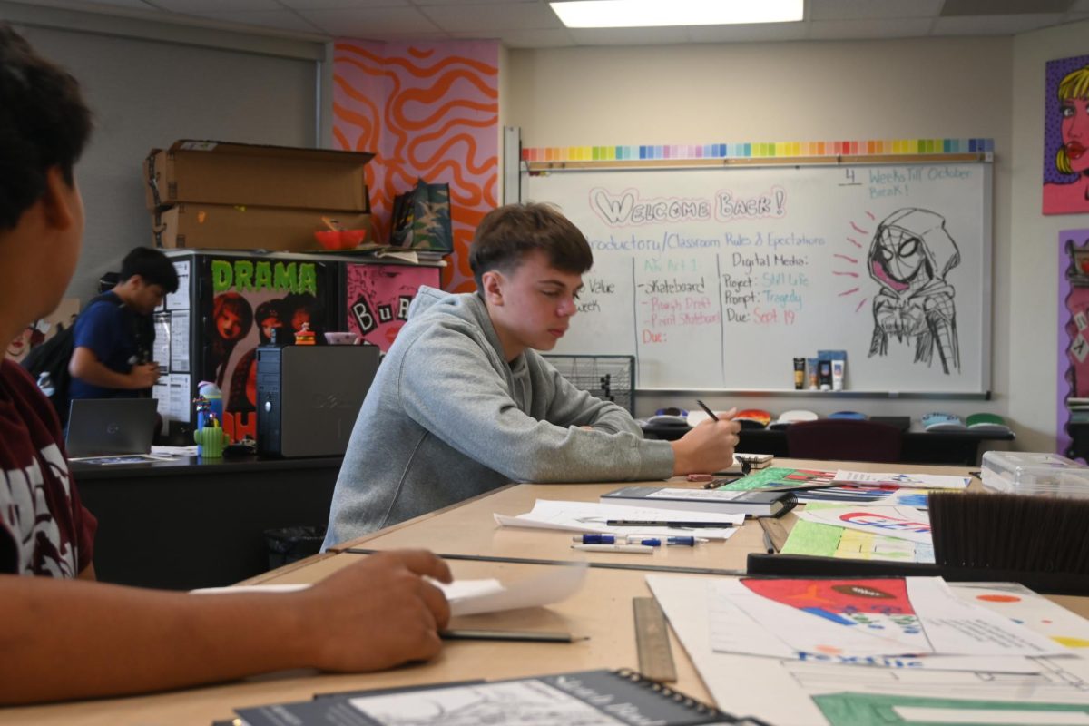 Students work on their art pieces in Ms. Hill's class.