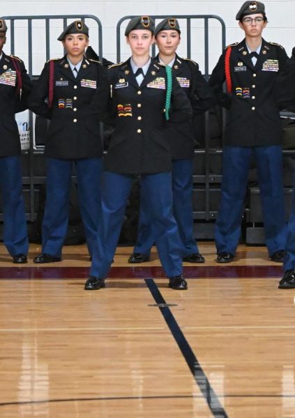 Alexandra Kozarsky stands at attention.