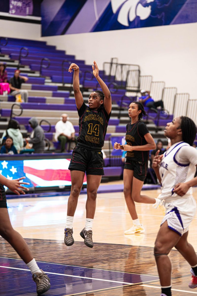 Junior Addison Martin shoots a midrange shot against Humble on Friday, Jan. 9.